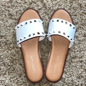 Studded white sandals